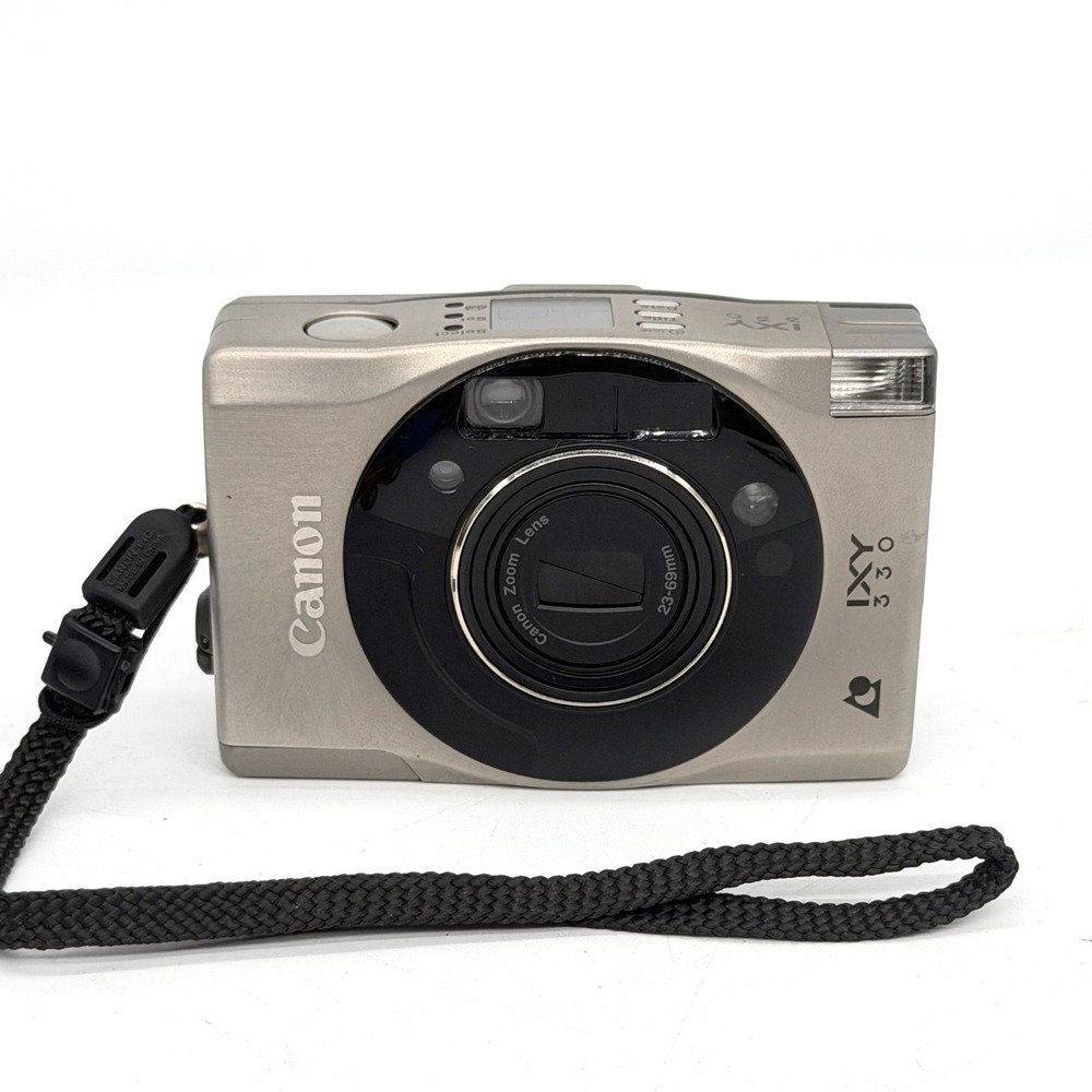 Canon IXY 330 APS Film Camera 23-69mm Zoom Lens Champagne Silver Made in Japan